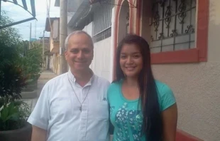 Mildred, the Peruvian goddaughter of Pope Leo XIV, with then-Father Robert Prevost. Credit: Courtesy of Mildred Camacho