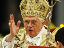 Pope Benedict gives the final blessing for Vespers at St. Paul's Outside the Walls