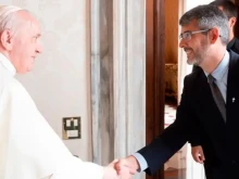 Pope Francis greets José David Correa González, superior general of the Sodalitium Christianae Vitae, at the Vatican, Oct. 30, 2021.