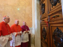Cardinal Kevin Farrell, Vatican Secretary of State Cardinal Pietro Parolin, and Archbishop Edgar Peña Parra preside over the sealing of the papal apartment at the Vatican’s Apostolic Palace, Monday, April 21, 2025.