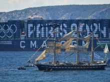 The French 19th-century three-masted barque Belem is seen from the Palais du Pharo in the southern port city of Marseille on May 8, 2024, before the Olympic Flame arrival ceremony, ahead of the Paris 2024 Olympic and Paralympic Games. The Belem is set to reach Marseille on May 8 and ten thousand torchbearers will then carry the flame across 64 French territories.
