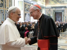 A new Vatican labor regulations decree was issued after an audience granted to Vatican Secretary of State Cardinal Pietro Parolin, pictured here with Pope Leo XIV.