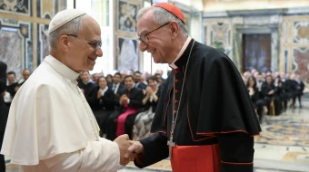 A new Vatican labor regulations decree was issued after an audience granted to Vatican Secretary of State Cardinal Pietro Parolin, pictured here with Pope Leo XIV.