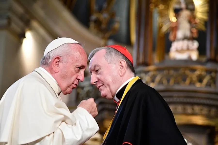 Pope Francis speaks with Vatican Secretary of State, Cardinal Pietro Parolin during his visit to Lima's Cathedral on January 21, 2018. ?w=200&h=150