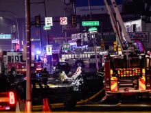 Emergency service members respond to a plane crash in a neighborhood near Cottman Avenue on Jan. 31, 2025, in Philadelphia. The plane, a medical transport jet carrying a child patient, crashed after taking off from Northeast Philadelphia Airport.
