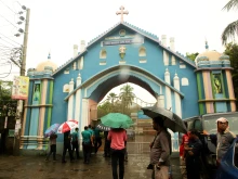 The main gate of Holy Rosary Church in Dhaka, Bangladesh, shows damage after two homemade bomb explosions on Oct. 8, 2025.