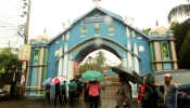 The main gate of Holy Rosary Church in Dhaka, Bangladesh, shows damage after two homemade bomb explosions on Oct. 8, 2025.