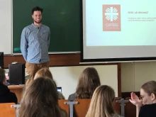 Simon Schwarz, head of the Caritas Vilnius Convicts Consultation Center, talks to university students  in Vilnius, Lithuania.