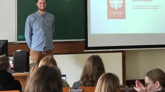 Simon Schwarz, head of the Caritas Vilnius Convicts Consultation Center, talks to university students  in Vilnius, Lithuania.