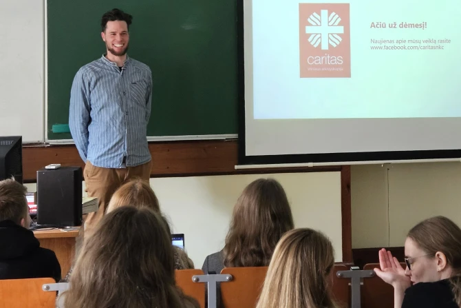 Simon Schwarz, head of the Caritas Vilnius Convicts Consultation Center, talking to university students  in Vilnius, Lithuania.