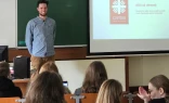 Simon Schwarz, head of the Caritas Vilnius Convicts Consultation Center, talks to university students  in Vilnius, Lithuania.