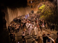 Procession from Saint-Jean Cathedral to Fourvière Basilica in Lyon, France, on Dec. 8, 2022.