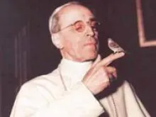 Pope Pius XII with his favorite bird, a canary