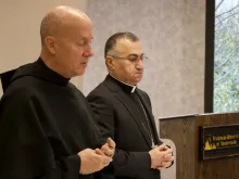 Father Dave Pivonka and Archbishop Bashar Warda pray together at Franciscan University, Dec. 6, 2019. 