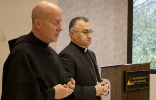 Father Dave Pivonka and Archbishop Bashar Warda pray together at Franciscan University, Dec. 6, 2019.   Courtesy photo
