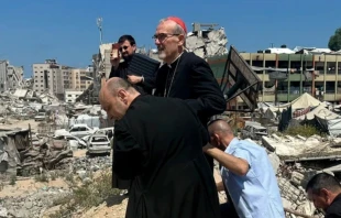 Cardinal Pierbattista Pizzaballa tours the war-torn area surrounding Holy Family Church with the parish’s pastor in Gaza, Father Gabriel Romanelli. Credit: Photo courtesy of Latin Patriarchate of Jerusalem