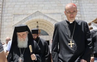The Latin Patriarch of Jerusalem, Cardinal Pierbattista Pizzaballa, and Greek Orthodox Patriarch Theophilos III, leave the church after a visit to Holy Family Parish in Gaza on July 18, 2025. Credit: Caritas Jerusalem