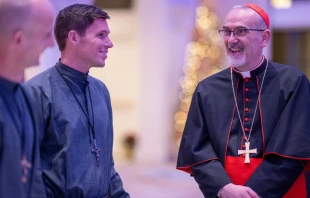 Cardinal Pierbattista Pizzaballa, the Latin patriarch of Jerusalem, speaks with members of the Society of Our Lady of the Most Holy Trinity (SOLT) during a Dec. 5, 2025, fundraising dinner to support of Christians in the Holy Land at St. John’s Resort in Plymouth, Michigan. Credit: Courtesy of  Detroit Catholic, photos by Tim Fuller