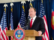 Colorado governor Jared Polis speaks at a press conference, June 11, 2020.