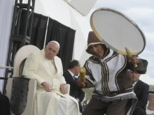 An indigenous dancer performs for Pope Francis on July 29, 2022, in Iqaluit in northernmost Canada.