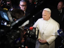 Pope Leo XIV speaks to reporters after a daylong stay at the papal villa of Castel Gandolfo on Nov. 25, 2025.