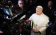 Pope Leo XIV speaks to reporters after a daylong stay at the papal villa of Castel Gandolfo on Nov. 25, 2025.
