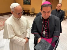 Pope Leo XIV receives a video from the Hope Border Institute from Auxiliary Bishop Anthony Celino on Oct. 8, 2025.