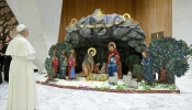 Pope Leo admires the Nativity scene that was made in Costa Rica.