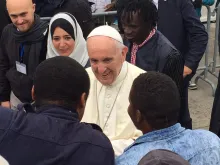 Pope Francis meets with migrants during a day trip to Bologna, Italy. 