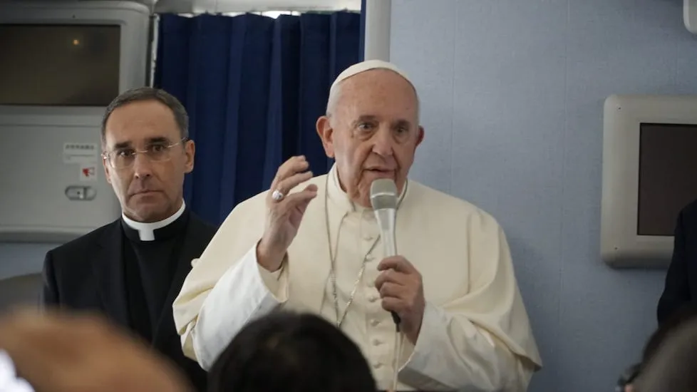 Pope Francis speaks aboard a Nov. 26 flight from Tokyo to Rome. ?w=200&h=150
