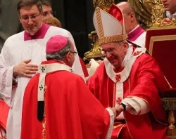 Pope Francis greets one of the 34 metropolitan archbishops to receive the pallium on the Feast of Saints Peter and Paul in St. Peter's Basilica on June 29, 2013. ?w=200&h=150