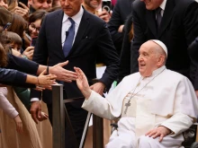 Pope Francis presides greets pilgrims at a penitential service at St. Pius V Parish in Rome on March 8, 2024.