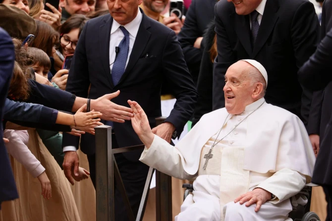 Pope Francis presides greets pilgrims at a penitential service at St. Pius V Parish in Rome on March 8, 2024