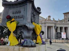 Flowers are laid in memory of Pope Francis in St. Peter’s Square at the Vatican, Monday, April 21, 2025.