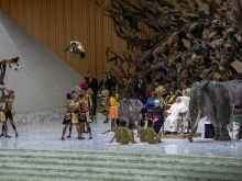 Pope Francis watches as performers put on a show at his general audience on Wednesday, Jan. 8, 2025, in Paul VI Hall at the Vatican.