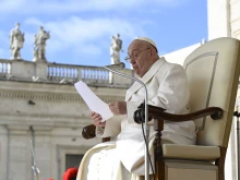 Pope Francis addresses pilgrims gathered in St. Peter’s Square at the Vatican for his Wednesday general audience on April 24, 2024.