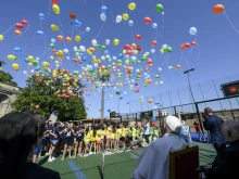 The kids and Pope Francis released biodegradable balloons into the sky together on July 18, 2024. The Vatican said the message, “You, dear boy, dear girl, are precious in God’s eyes,” was stamped on the balloons “with the hope that the message will reach as many people as possible.”