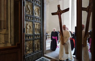 Pope Leo XIV passes through the Holy Door carrying the jubilee cross as he leads the pilgrimage of the Holy See on June 9, 2025. Credit: Vatican Media