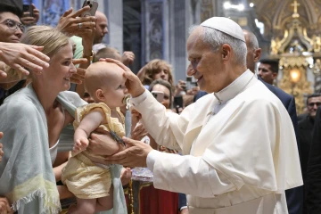 Pope Leo XIV blesses baby