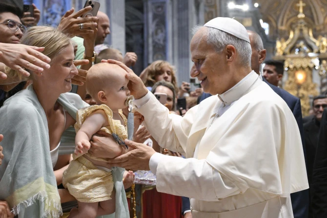 Pope Leo XIV blesses baby