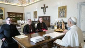Pope Leo XIV receives Bishop Pierre Goudreault of Sainte-Anne-de-la-Pocatière, president of the Canadian Conference of Catholic Bishops (center), Archbishop Richard Smith of Vancouver (right), and Father Jean Vézina, secretary-general of the Canadian bishops (left), in a Nov. 15, 2025, meeting at which the Holy Father gifted dozens of artifacts that originated with Indigenous peoples of the North American country. Leo at the meeting donated 62 pieces from the ethnological collections of the Vatican Museums to the Canadian bishops.