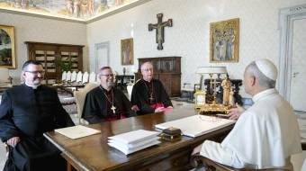Pope Leo XIV receives Bishop Pierre Goudreault of Sainte-Anne-de-la-Pocatière, president of the Canadian Conference of Catholic Bishops (center), Archbishop Richard Smith of Vancouver (right), and Father Jean Vézina, secretary-general of the Canadian bishops (left), in a Nov. 15, 2025, meeting at which the Holy Father gifted dozens of artifacts that originated with Indigenous peoples of the North American country. Leo at the meeting donated 62 pieces from the ethnological collections of the Vatican Museums to the Canadian bishops.