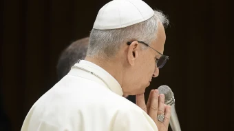 Pope Leo XIV prays during his Wednesday general audience on Aug. 13, 2025, in the Paul VI Audience Hall at the Vatican.