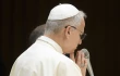 Pope Leo XIV prays during his Wednesday general audience on Aug. 13, 2025, in the Paul VI Audience Hall at the Vatican.