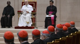 Pope Leo XIV addresses officials of the Roman Curia at the Vatican on Dec. 22, 2025.