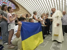 Pope Leo XIV meets with Ukrainian children who were welcomed by Caritas Italy during the summer on July 3, 2025, at the Vatican.
