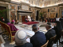 Pope Leo XIV meets with faith leaders on Monday, May 19, 2025, at the Vatican.