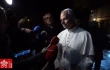 Pope Leo XIV answers questions from journalists as he leaves the papal residence of Castel Gandolfo on Tuesday, Nov. 18, 2025.