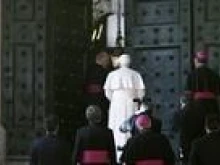 The newly restored Bronze Door to the Apostolic Palace