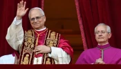 Pope Leo XIV looks out from the central balcony of St. Peter’s Basilica after his election on May 8, 2025.